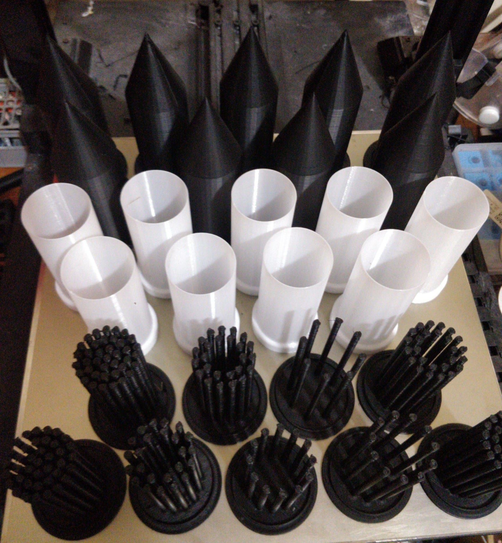 Rod-array electrodes, cylindrical separators, and tall tapered PMFC shells