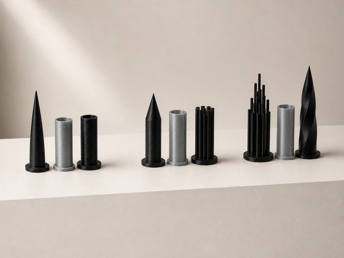 Three PMFC design generations, each grouped as a black anode, gray separator, and black cathode