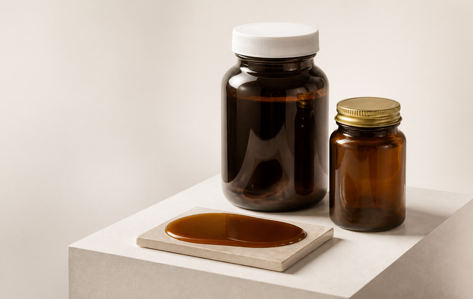 Set Goo material samples presented in amber laboratory jars